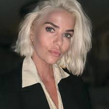 Download Laura Clare album songs: money can't buy you love