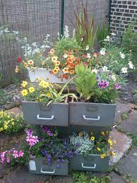 They are an intuitive design that contributes towards a vibrant office that employees can get excited about. Dresser Garden Made My Own At Last 2 Months Later Diy Garden Decor Diy Garden Unique Garden Art