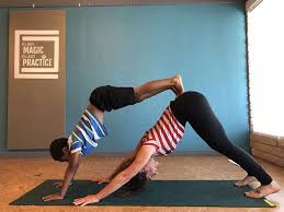 Kid S Yoga Double Dog How To 1 One Partner Gets Into Downward Facing Dog 2 The Other Partner Puts Their Feet On Thei Yoga For Kids Yoga Everyday Local Yoga