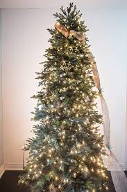 How To Put Ribbon Garland On A Christmas Tree Hunker Christmas Tree Ribbon Garland Christmas Tree Decorations Ribbon Christmas Tree Garland