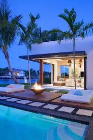 15 Striking Tropical Patio Designs That Make The View Even More Enjoyable Beach House Decor Mansions Outdoor
