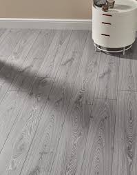 The appearance of wide planks is a further nod to the floor's antique design roots. Villa Timeless Oak Grey Laminate Flooring Direct Wood Flooring