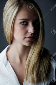 White is the last shade you can choose on the blonde color spectrum. Young Adult Caucasian Woman With Long Blonde Hair And Green Eyes Wearing A Plain White Shirt With Flawless Skin And Natural Makeup Stock Photo Picture And Royalty Free Image Image 13644584