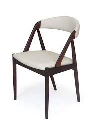Kai Kristiansen Danish Rosewood Curved Back Dining Chairs In White At 1stdibs 1960s danish rosewood and mahogany dining chairs with curved back rests.