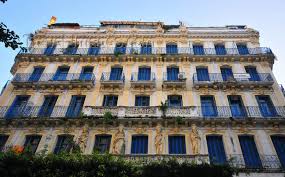 Macron met four of the grandchildren of ali boumendjel and admitted in the name of france that the lawyer had been detained, tortured and killed in algiers on march 23, 1957. Algeria662 Algiers Alger Algeria Algerie Beautiful Colonial Building Ali Boumendjel Street Beau Ba Colonial Architecture Architecture Travel Images