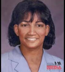 Karin Godfrey was 9 years old and went to the Whitewater Public Library.  She tried to check out a book but had no library card. She took off her  coat and showed