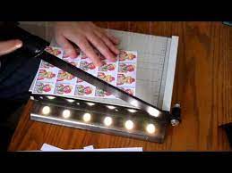 Then, carefully fold more tape over the items and press it down to remove any air bubbles (you can also use a credit card to help with this step). Make A Laminated Business Or Hobby Card Youtube