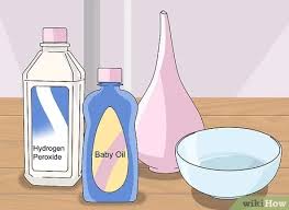 Although cleaning dog ears with hydrogen peroxide is still a controversial topic, so far, every indication is that it's okay to do so. 3 Ways To Clean Ears With Peroxide Wikihow