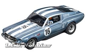 The 1967 Ford Mustang Was The First Re Vamp Of The Original Fitted With A Big Block V8 Engine The New Racing Blue Fastback M Ford Mustang Gt 32 Ford Mustang Gt