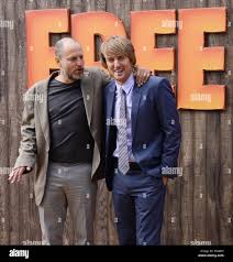 Cast Members Woody Harrelson L The Voice Of Jake And Owen Wilson The Voice Of Reggie In The Animated Motion Picture Comedy Free Birds Attend The Premiere Of The Film At The