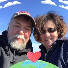 What happens when two balls with purple dots land in the same area?