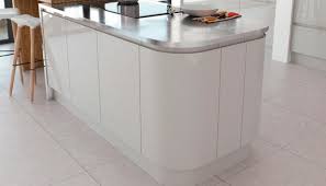 Add light grey kitchen tiles with white grout for a clean kitchen design and finish with suede kitchen bar stools. Light Grey Gloss Kitchen Launched By Value Range