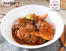 Sate padang hidangan dari padang dan daerah sekitarnya di sumatra barat yang terbuat dari jeroan sapi atau kambing yang direbus dengan bumbu, lalu dipanggang. Gulai Kambing Dari Sari Ratu Masakan Padang Foodspot