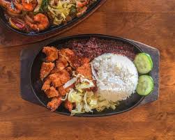 Sabah Eats On Instagram Nasi Lalap Served Sizzling Hot On Hot Plate At Sizzle Love The Sambal Serve With The Fried Chi Eat Fried Chicken Food Plating