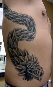 The following gallery showcases some of the most amazing tattoo designs referencing the feathered serpent in fantastic colors and black and gray. Tribal Quetzalcoatl Tattoo Novocom Top