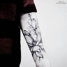 Black And White Lily Tattoo Men Magnolia Tattoo Design For Men Magnolia Flower Tattoos Are Mostly Worn By Women However As They Tattoos Sleeve Tattoos For Women Nature Tattoo Sleeve Women