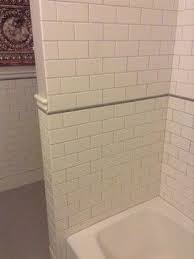 Vivant glazed wall tile is a timeless collection that delivers flexibility in both style and design. Gray Pencil Liner Tile With Chair Rail And Subway Tile New House Bathroom Decorating Bathroom Bathrooms Remodel