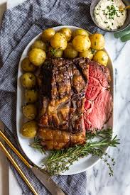 Remove the roast from the fridge 2 hours before cooking and season with salt. Slow Roasted Prime Rib Recipe Fox And Briar