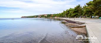 ¿tiene tu hotel acceso ¿dónde en la playa puedo encontrar un bar para tomar un cocktail? Playa Ankaran Ankaran Obalno Kraska Eslovenia Beachrex Com