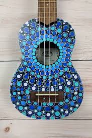 Check out our stunning collection of bohemian hippie style tapestries & wall hangings online. Hang This Painted Ukulele On Your Wall As A Beautiful Bohemian Art Piece And Grab It Down When Friends Come Over To Painted Ukulele Guitar Art Diy Ukulele Art