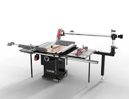 The plans call for attaching the rear part of the guard to a 1 1/2 conduit tube that would run down the back side of the table and attach to a mast attached on the right side of my extension table. A New Generation Of Table Saws Woodshop News