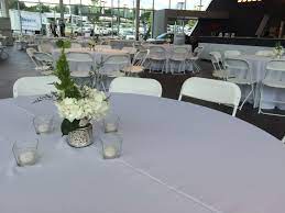 White Hercules Chairs And 60 Round Tables At The Jim Ellis Audi Atlanta Showroom Party Event Rental Chair Table Lin Table Decorations Table Table Cloth