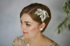 Most bridal hair accessories can be made onto a headband, and the band can then just be placed into your finished hairdo. How To Style Wedding Hair Accessories With Short Hair Short Hair Styles Pixie Hair Accessories Short Hair Bride