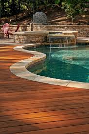 If you extend the deck on one side, you create a place choose lumber size according to the spans you have and the size of your pool and deck. Pt Wood Deck For Pool Inground Pool Landscaping Decks Around Pools Pool Landscape Design