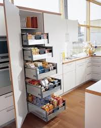 Pin On Kitchen Add recessed cubby spaces along a galley style kitchen wall to provide storage that doesn't require enough space to open and close cabinet doors.