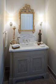 Whether you design the entire room around this one or add it in as the finishing touch, it's classic style is easy to pair with a variety of different decor. Pin By Amy Chavez On Bathrooms Powder Room Vanity Powder Room Small Powder Room Sink