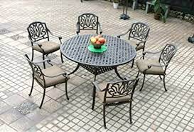 Check spelling or type a new query. Amazon Com 7 Piece Patio Dining Set 1 Round 60 Table And 6 Elisabeth Dining Chairs Desert Bronze Patio Lawn Garden