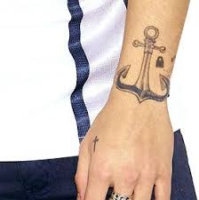 As a part of his half arm tattoo sleeve, zayn has a bandana tattooed on his right elbow. Harry Styles 52 Tattoos Their Meanings Body Art Guru