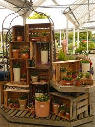 Pin By Christin K On Container Displays Flower Shop Display Garden Center Displays Succulent Display
