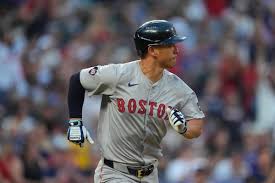 Red Sox bring back veteran outfielder by picking up option for 2025 - masslive.com