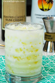A sweet and boozy tropical banana pound cake made with coconut milk, rum, lime juice, bananas, and a sprinkle of. Toasted Coconut Rum Pineapple Cream Cocktail The Farmwife Drinks
