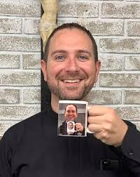 It's FrMathias Thelen birthday today! Here he is taking his yearly photo  with his inception mug.