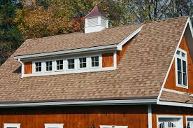 The windows in eyelid dormers allow a lot of light into the interior rooms. Features Newport Custom Garage The Barn Yard Great Country Garages