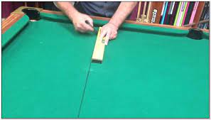 Map out where you plan on putting the pool table and make a marking on the ground to see how much space you'll have on either side and see if it will work in that. 6 Foot Pool Table Markings Design Innovation