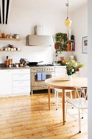 Thermo mugs, plates, birch trays, runners, napkins, tea towels, apron, oven gloves and candle holders. Rustic Touches Coupled With Scandinavian Style Inside This London Home Decoist Eclectic Kitchen Scandinavian Kitchen Design Scandinavian Kitchen