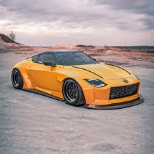 No, we're not talking about some rendering or yet more photos of the z proto concept. Nissan 400z Concept Gets Widebody And Rocket Bunny Makeovers Flipboard