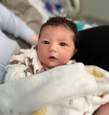 That is a beautiful child and look at all that hair