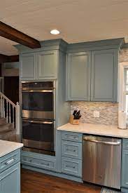 Moody Blue Sw6221 Color Haas Signature Collection Oxford V Door Style Maple Kitchen Colors Blue Cabinets Kitchen