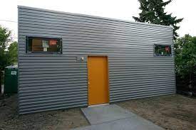 Instead of replacing old aluminum siding, it is often more cost effective to repaint it. Modern Corrugated Metal Siding Novocom Top