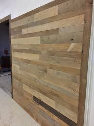 Contemporary sleek dining room with rustic wood plank wall. 24sf Reclaimed Barn Wood 8ft Long Plank Wall Paneling Kits Wood Panel Walls Vintage Wood Floor Wall Paneling