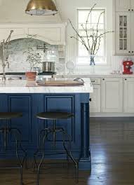 The big, blue kitchen island with a wood countertop as a focal point adds color to your kitchen. Lucy Fox Lucyfox5f2gva7y Blue Kitchen Island Dark Blue Kitchens Kitchen Trends