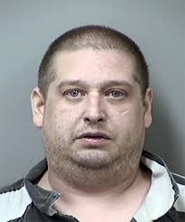 Murder suspect disrupts arraignment with outbursts