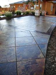 Elite Crete Systems This Driveway Was Overlayed With Texture Pave Pre Mixed Overlay To Create What I Stained Concrete Driveway Concrete Decor Concrete Patio