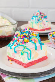 No Bake Rainbow Unicorn Cheesecake Bars This Easy Dessert Is Loaded With Colorful Marshmallows Pink Cookies And Lo Desserts Spring Desserts Cheesecake Bars