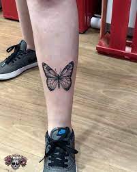 Tatuagem De Borboleta Na Canela