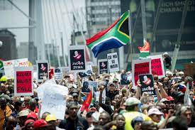 Shopkeepers fire on mob to protect their stores and ten people are killed in mall looting stampede as death toll in riots sparked by president zuma's jailing passes 40. Thousands March In South Africa To Call For Jacob Zuma S Resignation The New York Times